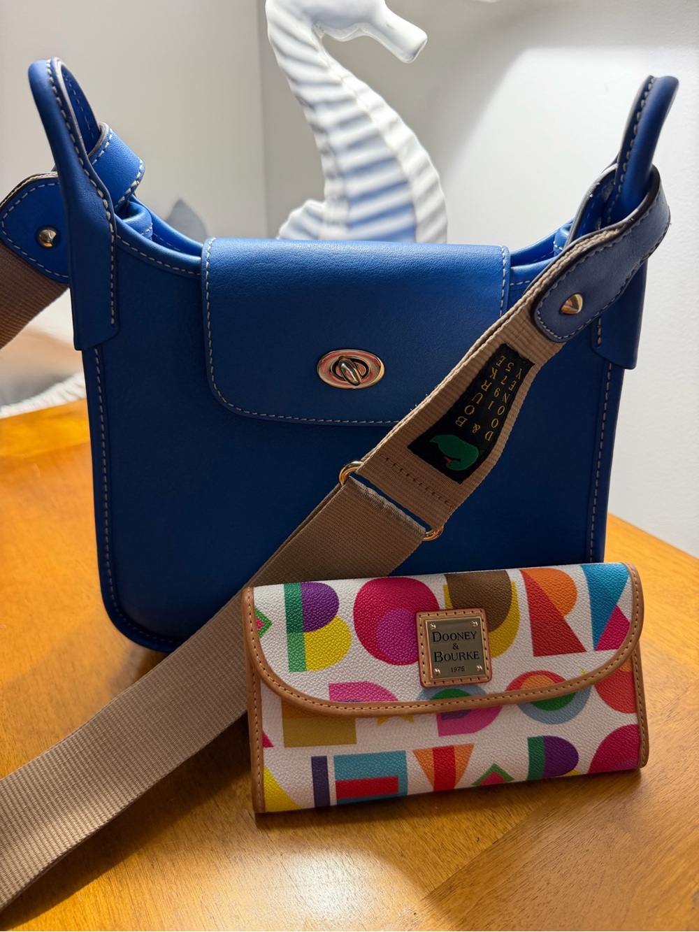 Dooney & Bourke Blue Leather Crossbody with Multicolor Logo Wallet